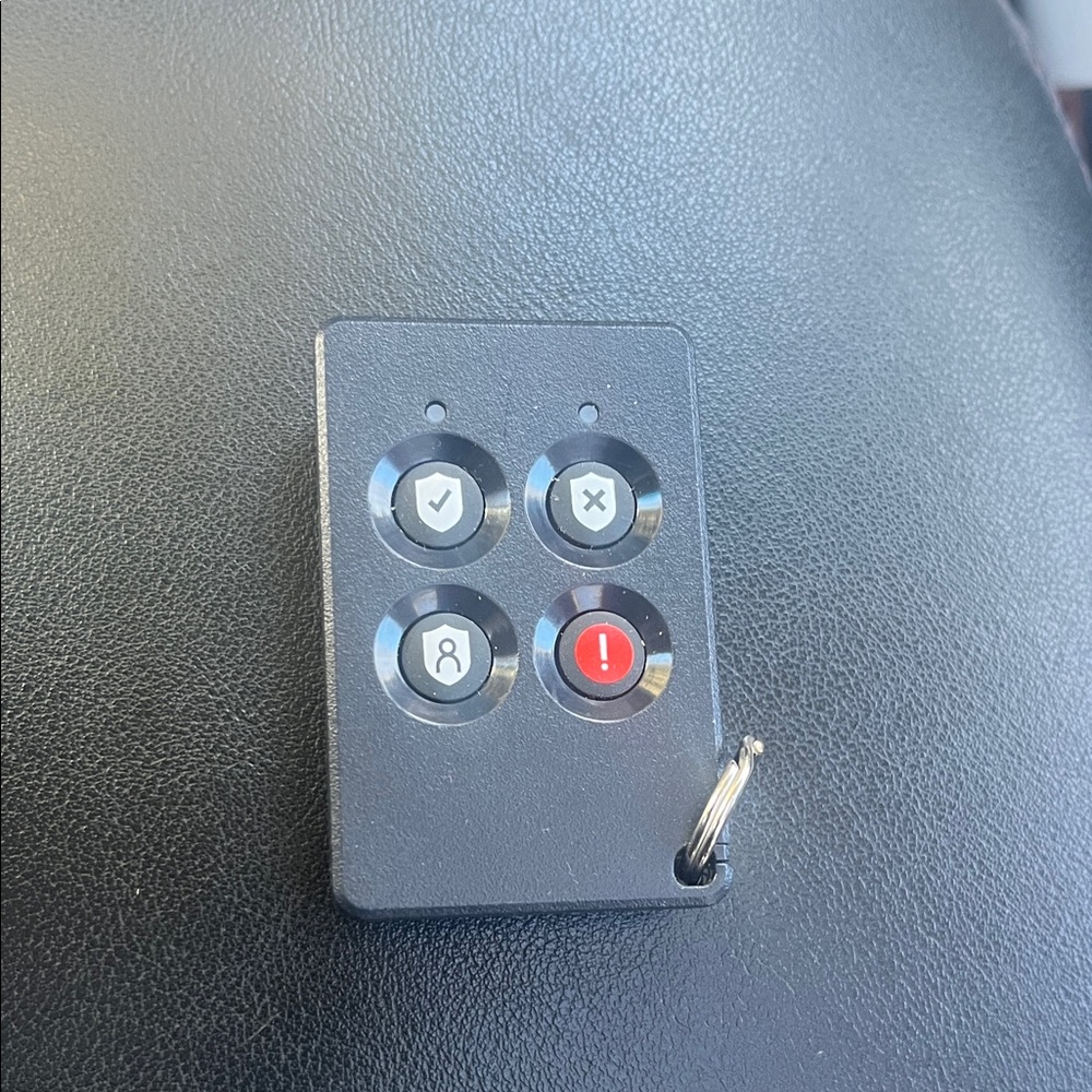 ADT Key-fob. It controls your ADT system from a distance.